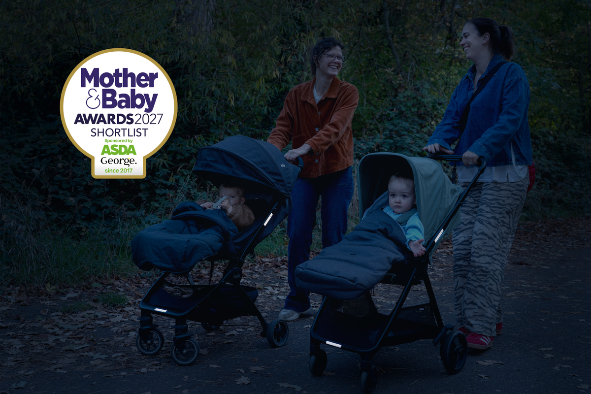 Two women push pushchairs with babies outdoors on a dark path, with a Mother & Baby Awards 2027 Shortlist badge overlaid on the top left.